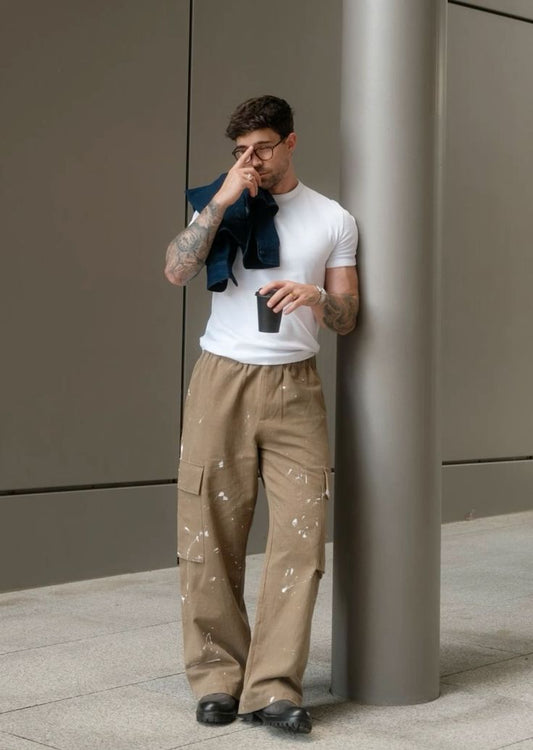 Collage of stylish men’s fashion pieces including bold prints, oversized jackets, and statement accessories, representing the top 10 men’s fashion trends for 2025, showcasing diverse and modern looks.